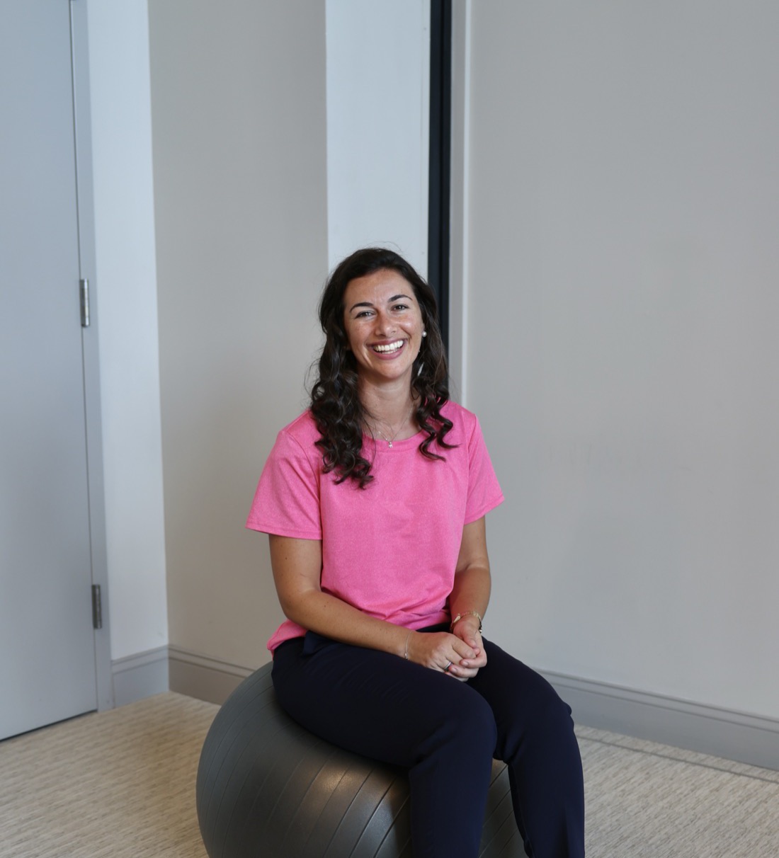 Dr. Rachel Benjamin demonstrating exercise-ball work